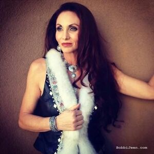 Elegant Black Lambskin Leather Vest with Blue Fox Fur Trim And Silver Studs